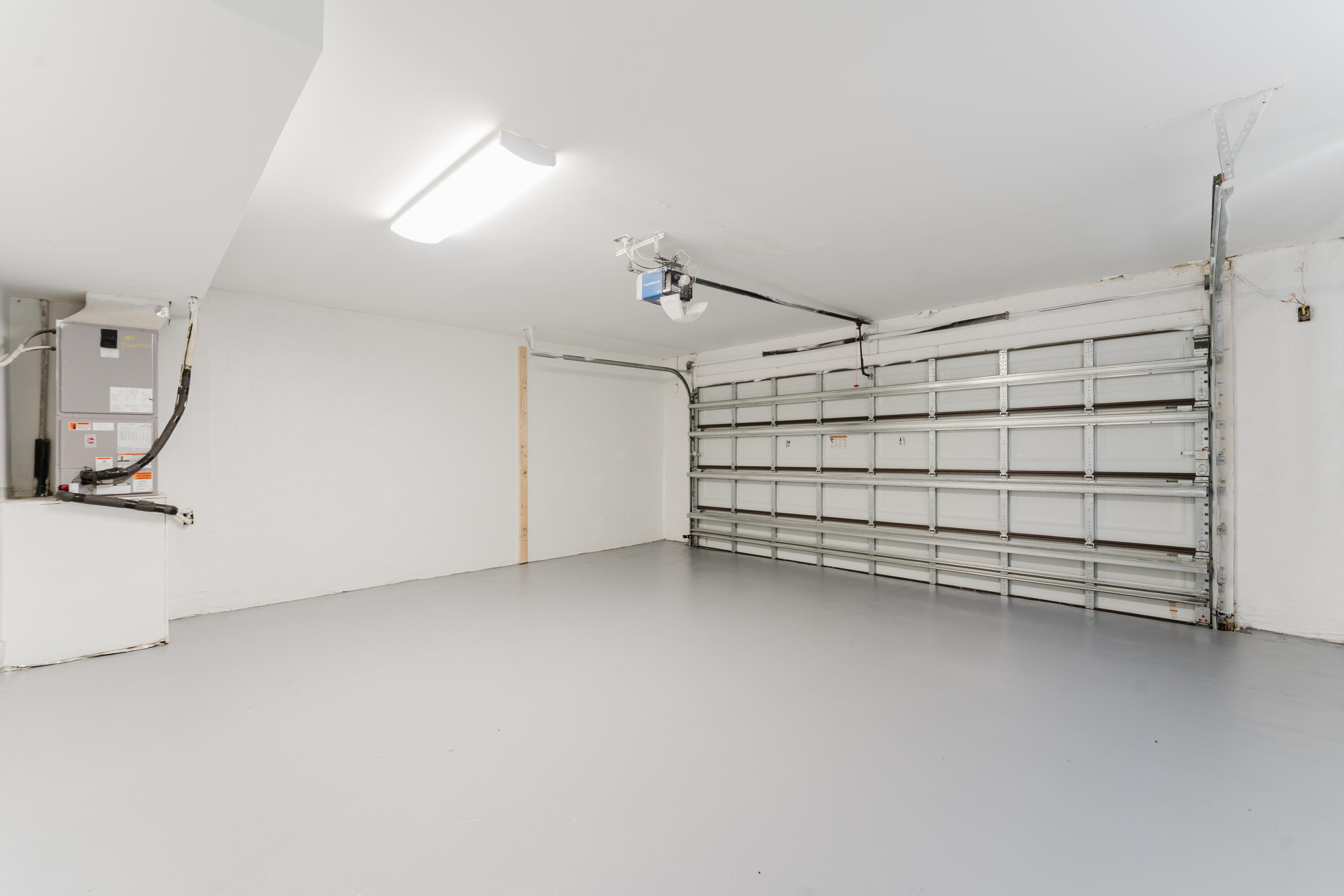 665 Jeffery Street Boca Raton, FL 33487 - Photo 19 of 44 a view of a room with racks on the wall