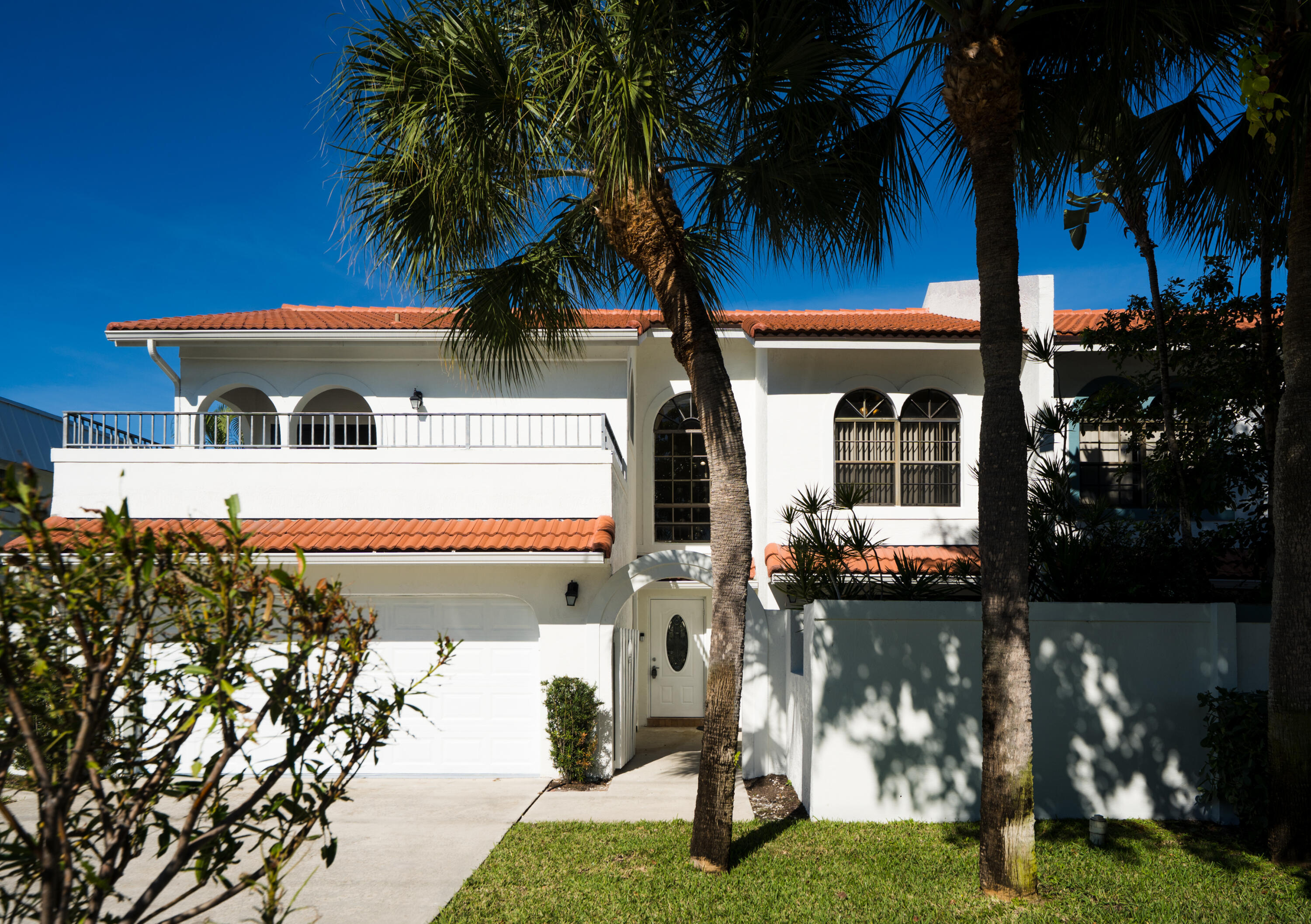 665 Jeffery Street Boca Raton, FL 33487 - Photo 2 of 44 a view of a house with a yard