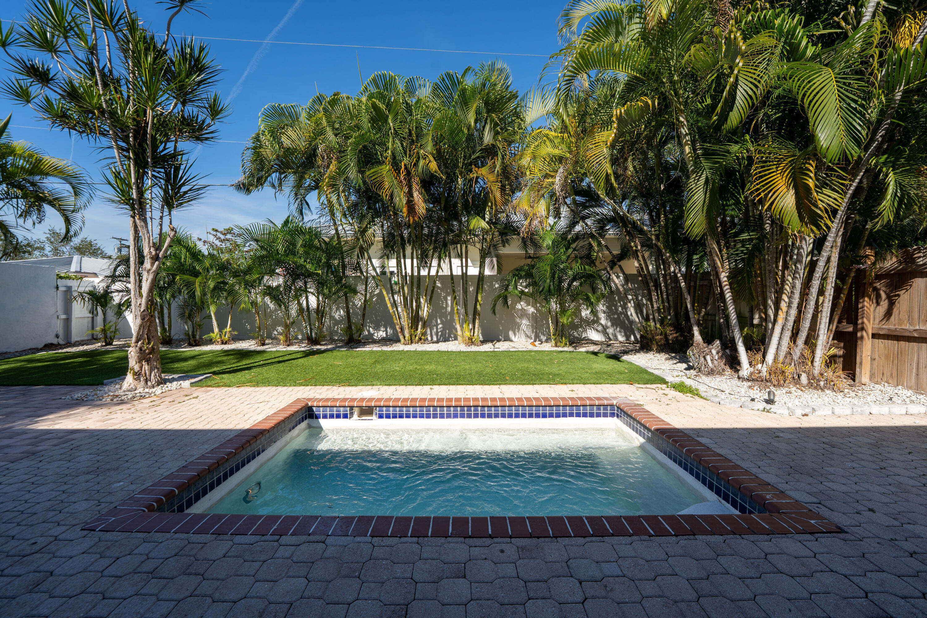 665 Jeffery Street Boca Raton, FL 33487 - Photo 41 of 44 a view of a yard with plants