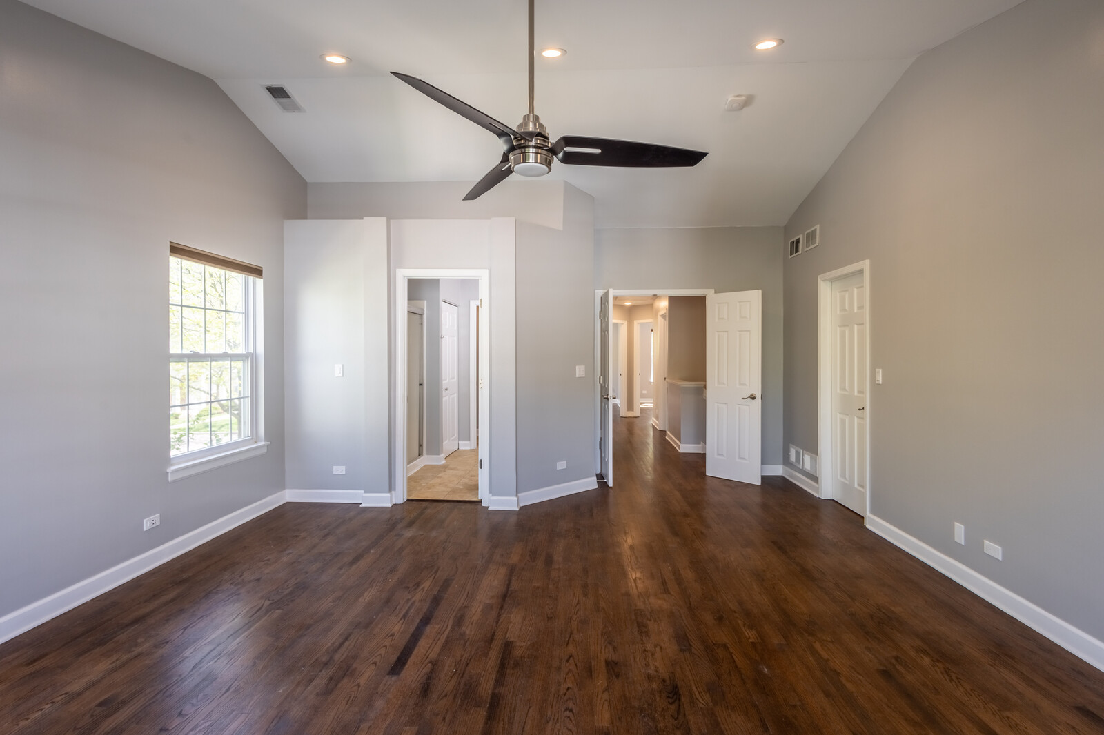 1244 Georgetown Way Vernon Hills, IL 60061 - Photo 11 of 17 a view of an empty room with wooden floor and a window