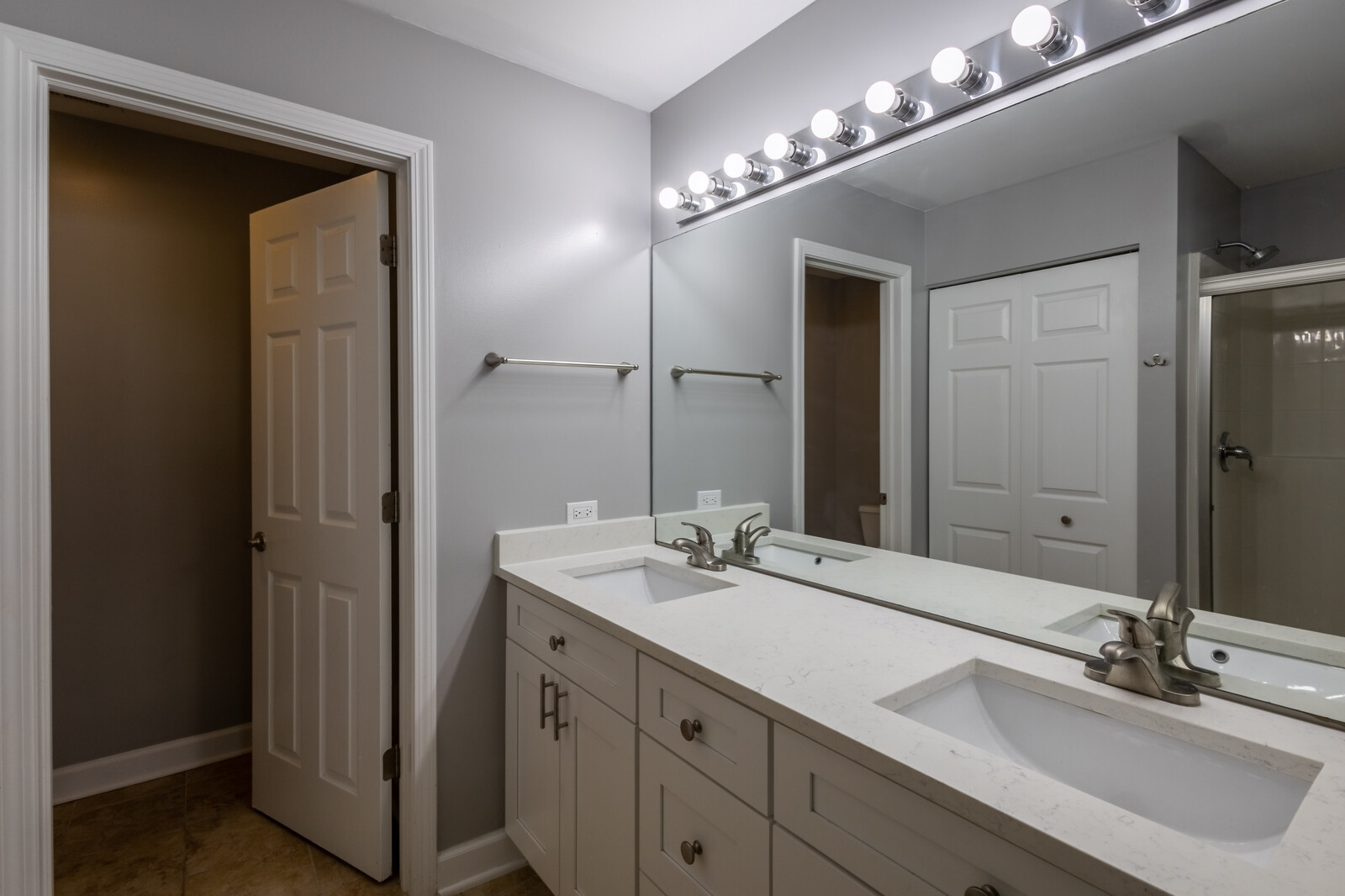 1244 Georgetown Way Vernon Hills, IL 60061 - Photo 13 of 17 a bathroom with a sink double vanity and a mirror