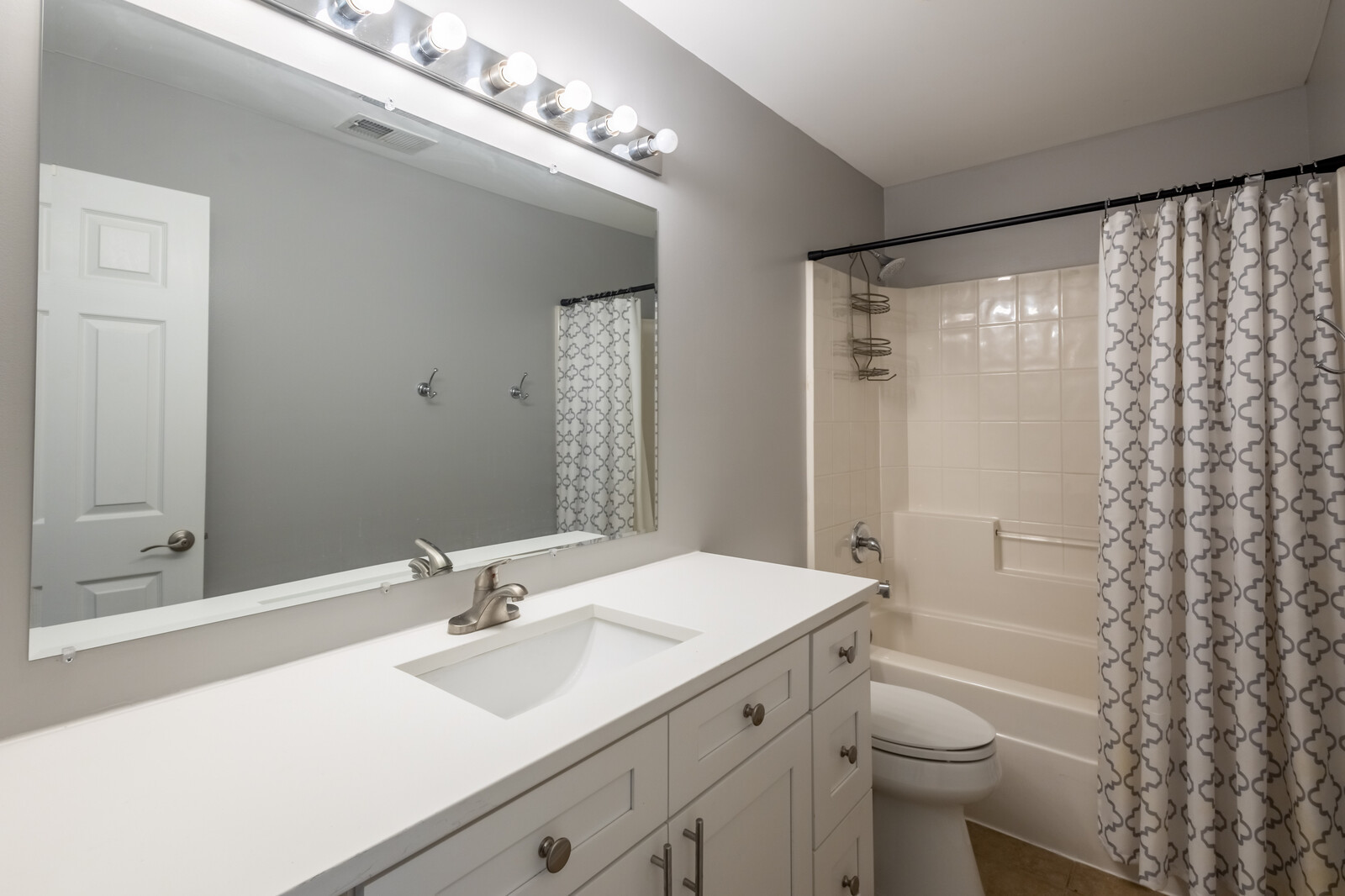 1244 Georgetown Way Vernon Hills, IL 60061 - Photo 14 of 17 a bathroom with a sink a toilet and shower