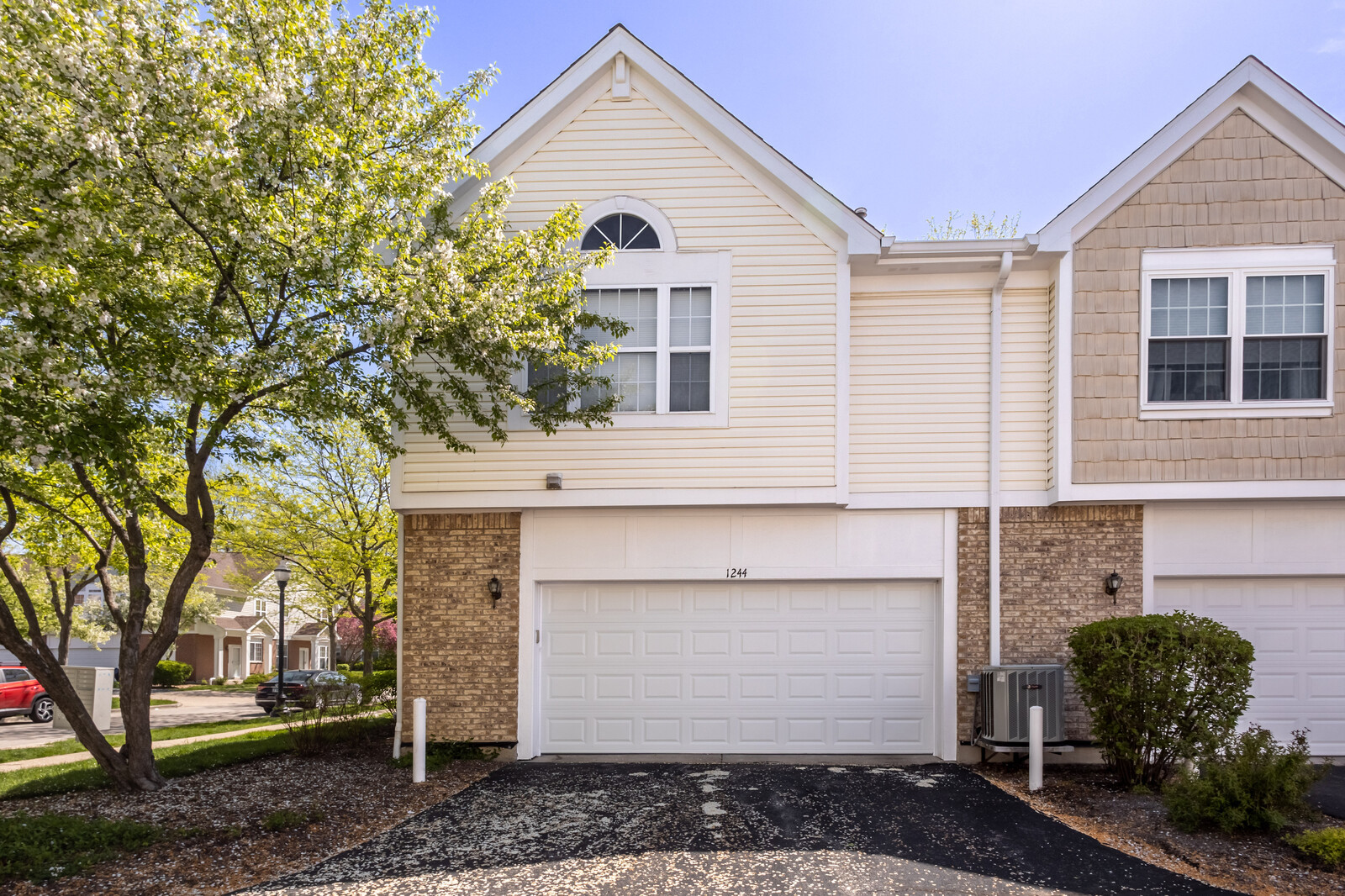 1244 Georgetown Way Vernon Hills, IL 60061 - Photo 17 of 17 a front view of a house with garden