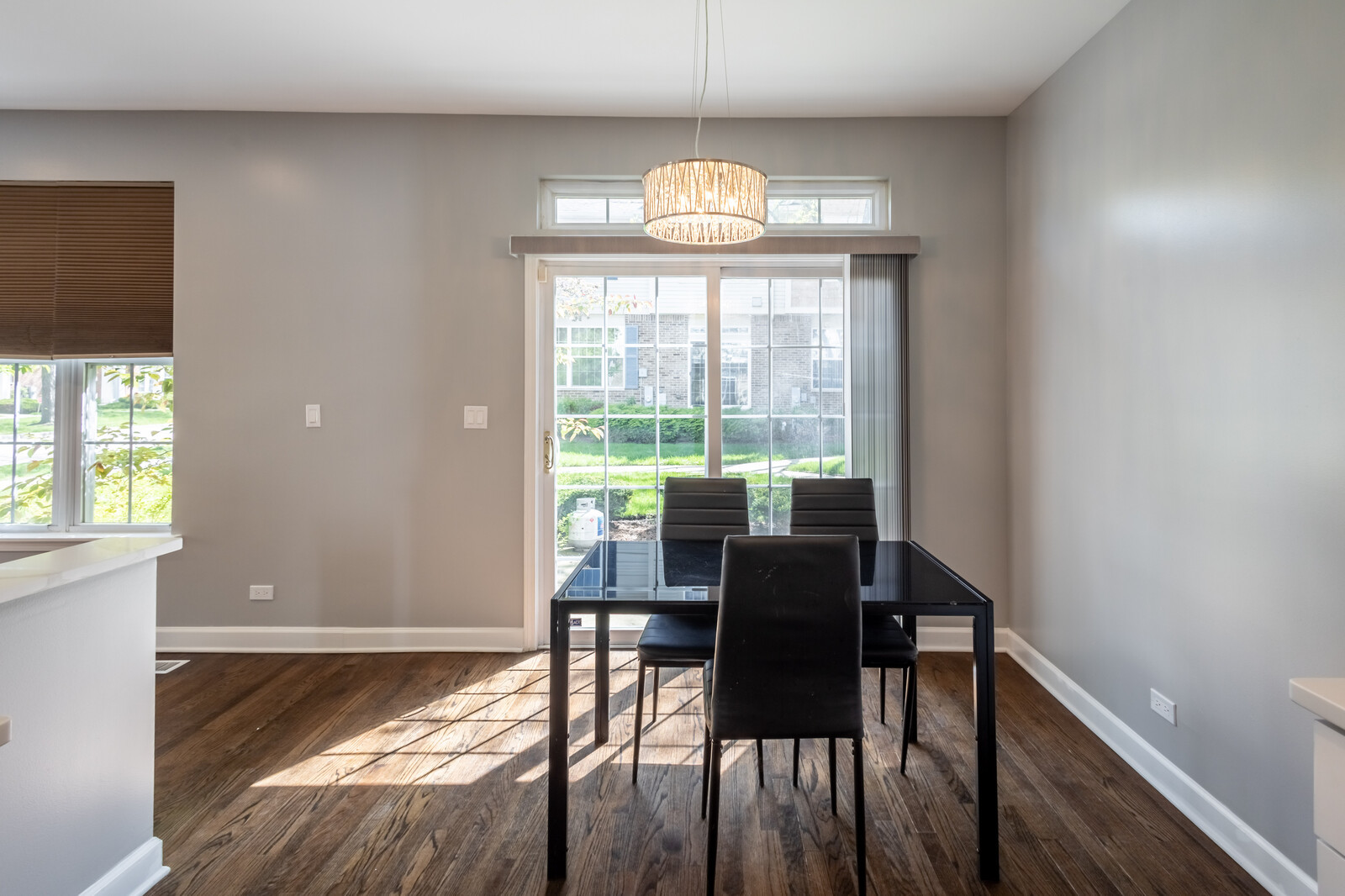 1244 Georgetown Way Vernon Hills, IL 60061 - Photo 9 of 17 a view of a dining room with furniture a chandelier and wooden floor