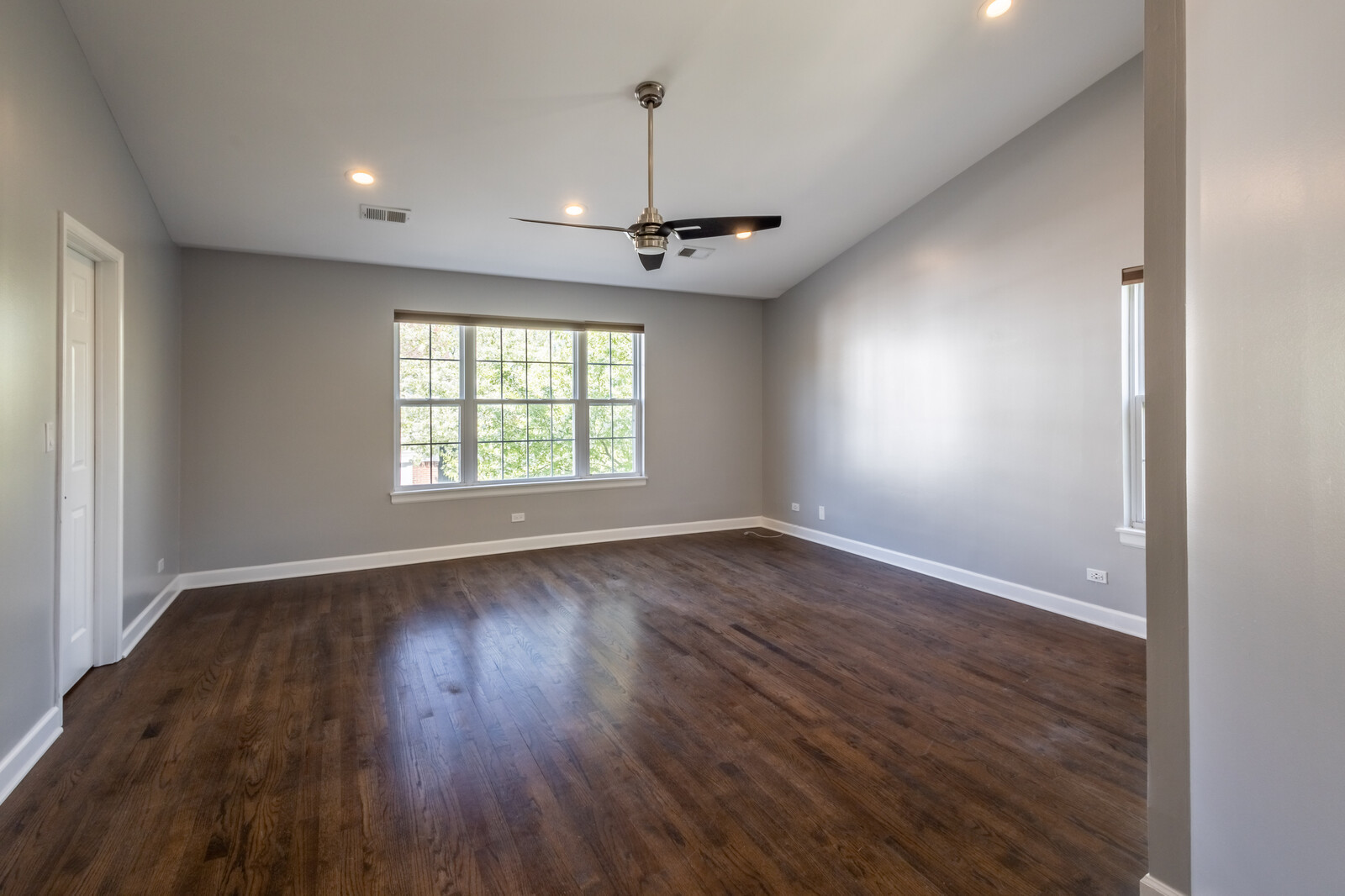 1244 Georgetown Way Vernon Hills, IL 60061 - Photo 10 of 17 wooden floor in an empty room with a window