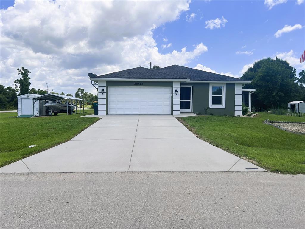 26513 Glaspell Road Punta Gorda, FL 33955 - Photo 1 of 1 Front with driveway