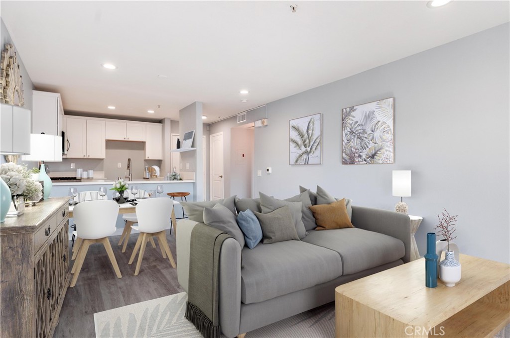 450 East 4th Street, Unit 221 Santa Ana, CA 92701 - Photo 1 of 43 a living room with furniture and kitchen view