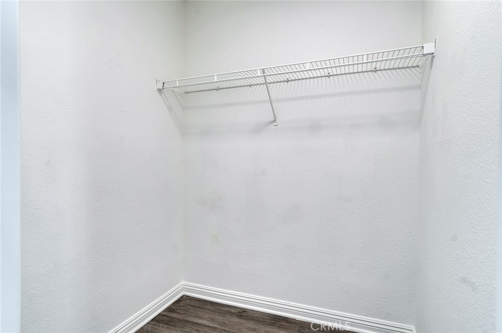 450 East 4th Street, Unit 221 Santa Ana, CA 92701 - Photo 18 of 43 a view of a room with racks on the wall