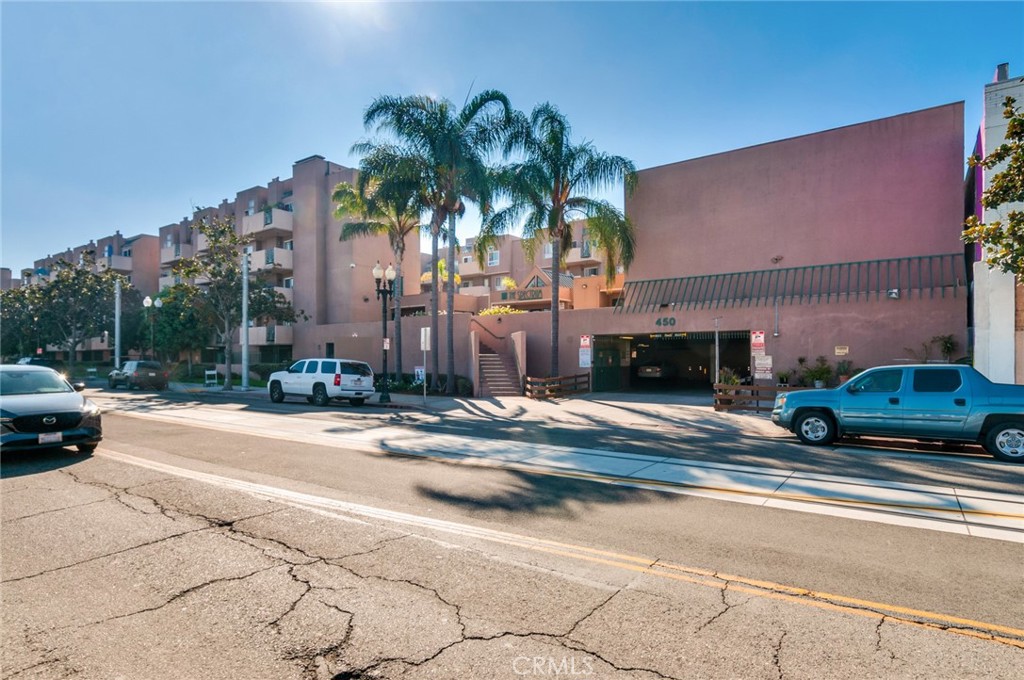 450 East 4th Street, Unit 221 Santa Ana, CA 92701 - Photo 30 of 43 a cars parked on the side of a street