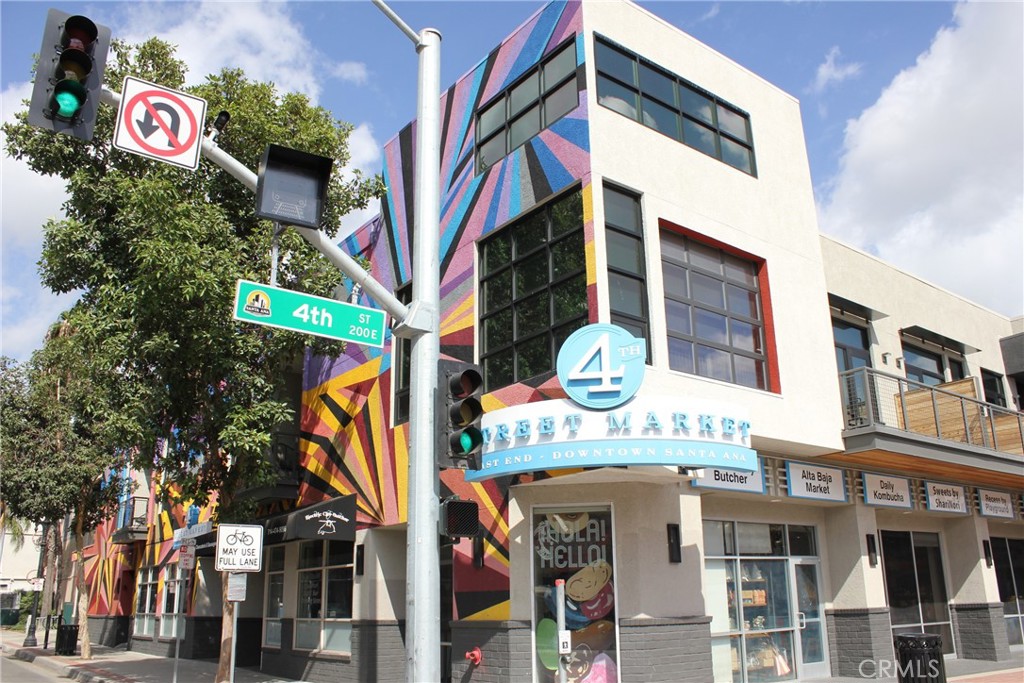 450 East 4th Street, Unit 221 Santa Ana, CA 92701 - Photo 35 of 43 a sign that is on a pole