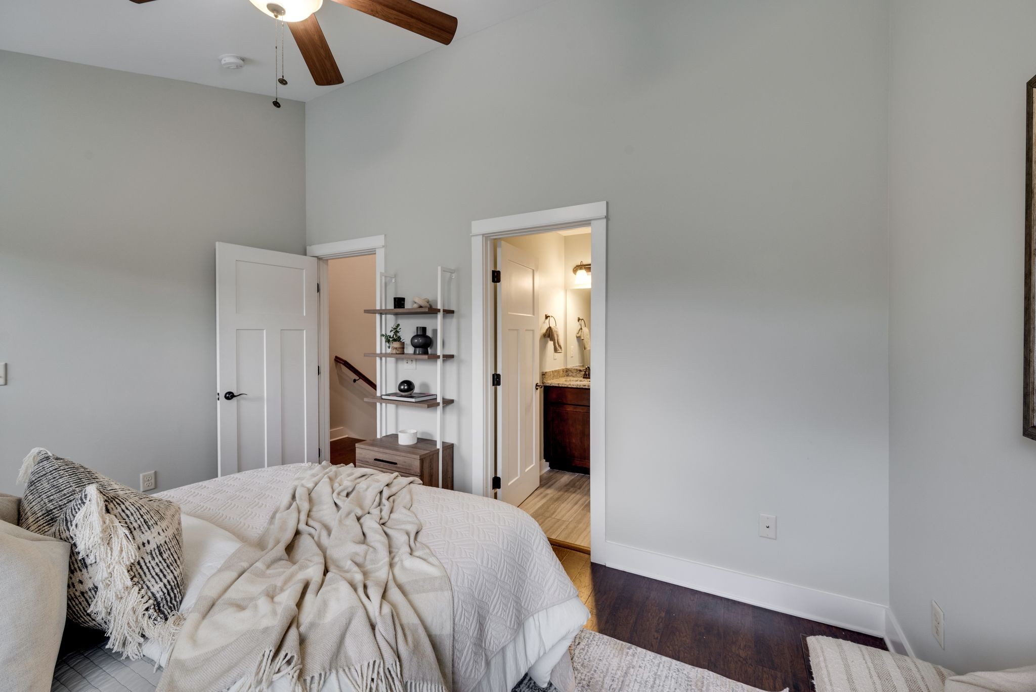 1106 Stratford Avenue, Unit 3 Nashville, TN 37216 - Photo 14 of 23 a bedroom with a bed and a chandelier