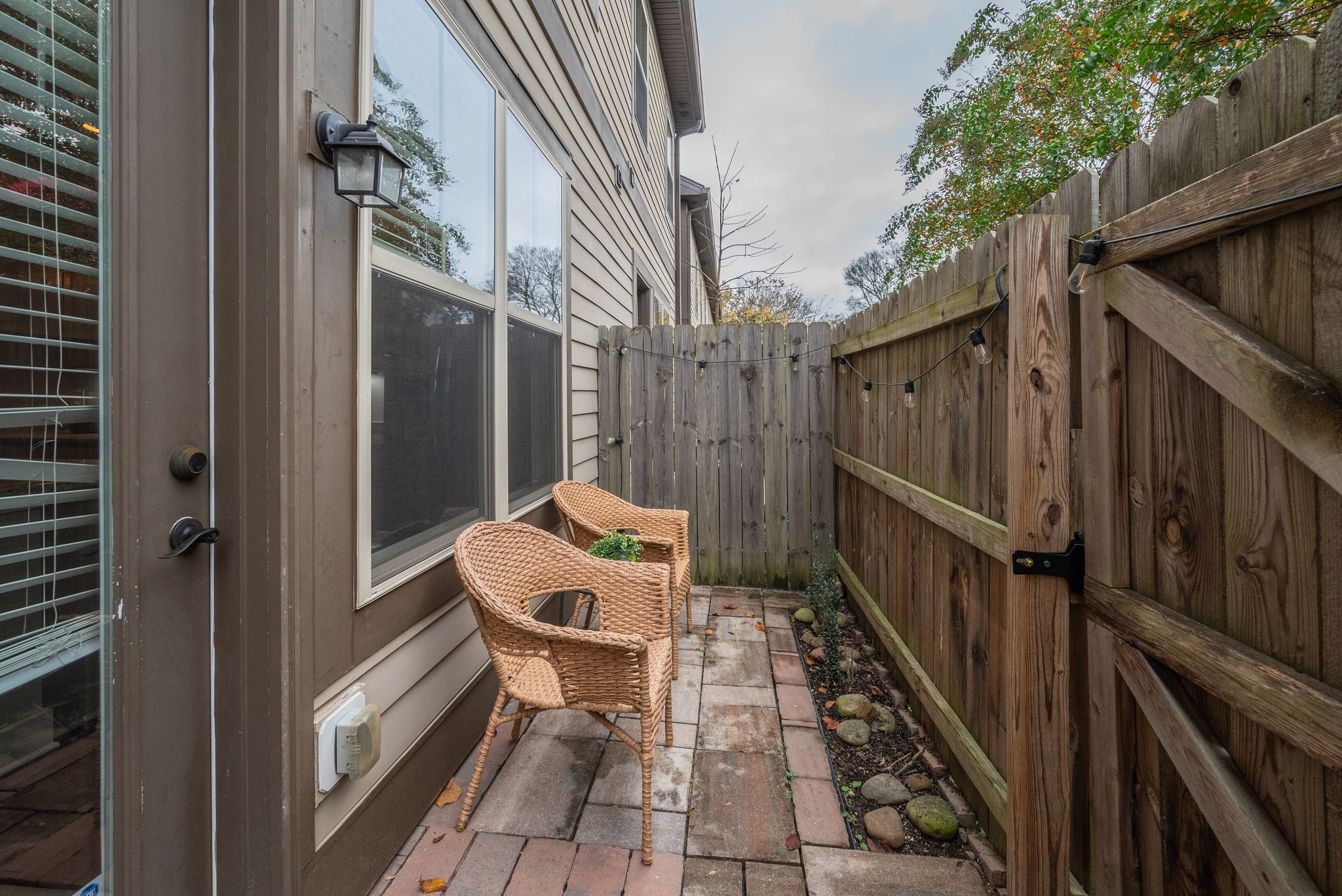 1106 Stratford Avenue, Unit 3 Nashville, TN 37216 - Photo 23 of 23 a view of a patio with chair and door