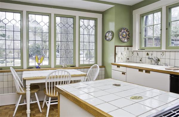 104 Crofton Road Newton, MA 02468 - Photo 6 of 30 a kitchen with a table chairs and a window