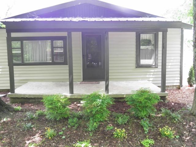2774 Cole Ridge Road Beechgrove, TN 37018 - Photo 3 of 20 Rocking chair porch for you and your dog.