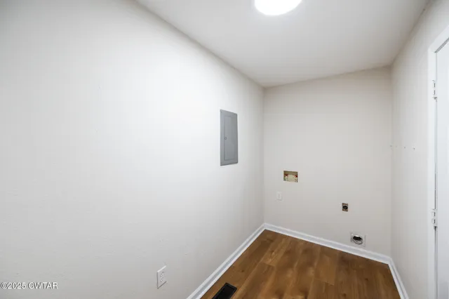 a view of balcony with wooden floor and fence