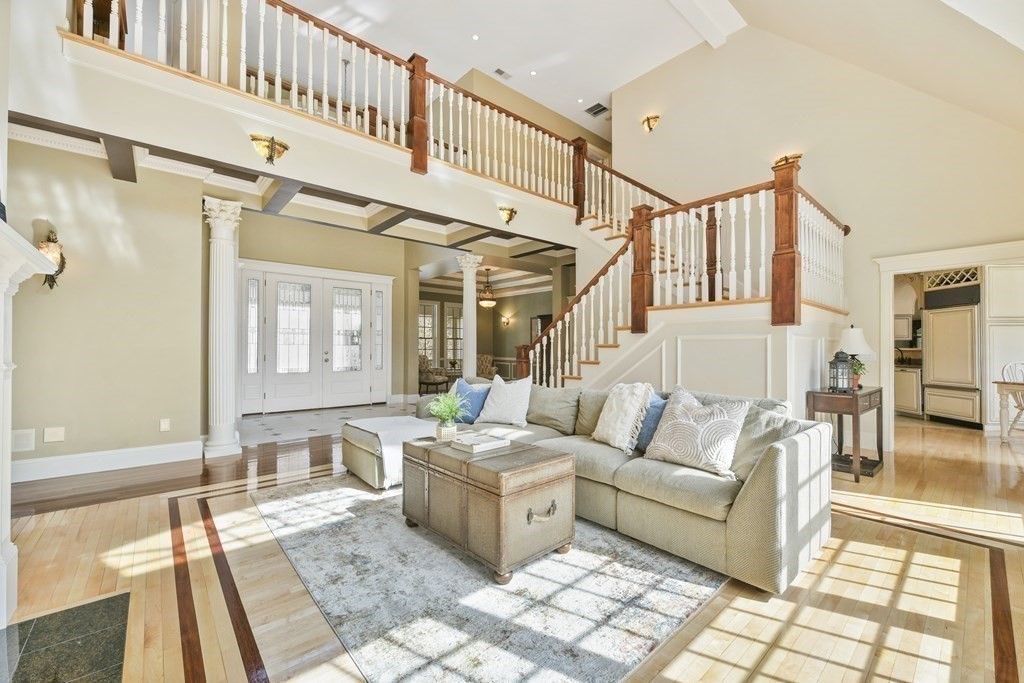 19 Whippoorwill Lane Concord, MA 01742 - Photo 15 of 33 a living room with furniture and a rug