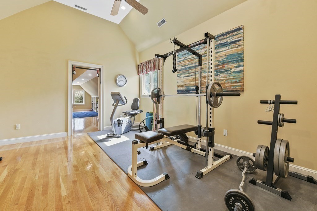 19 Whippoorwill Lane Concord, MA 01742 - Photo 22 of 33 a view of a room with gym equipment