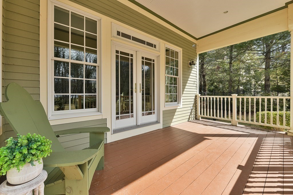 19 Whippoorwill Lane Concord, MA 01742 - Photo 27 of 33 a porch with seating space