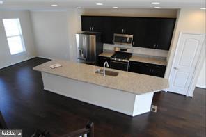 43345 Polenta Terrace Chantilly, VA 20152 - Photo 11 of 43 View of kitchen & Island with no current furniture