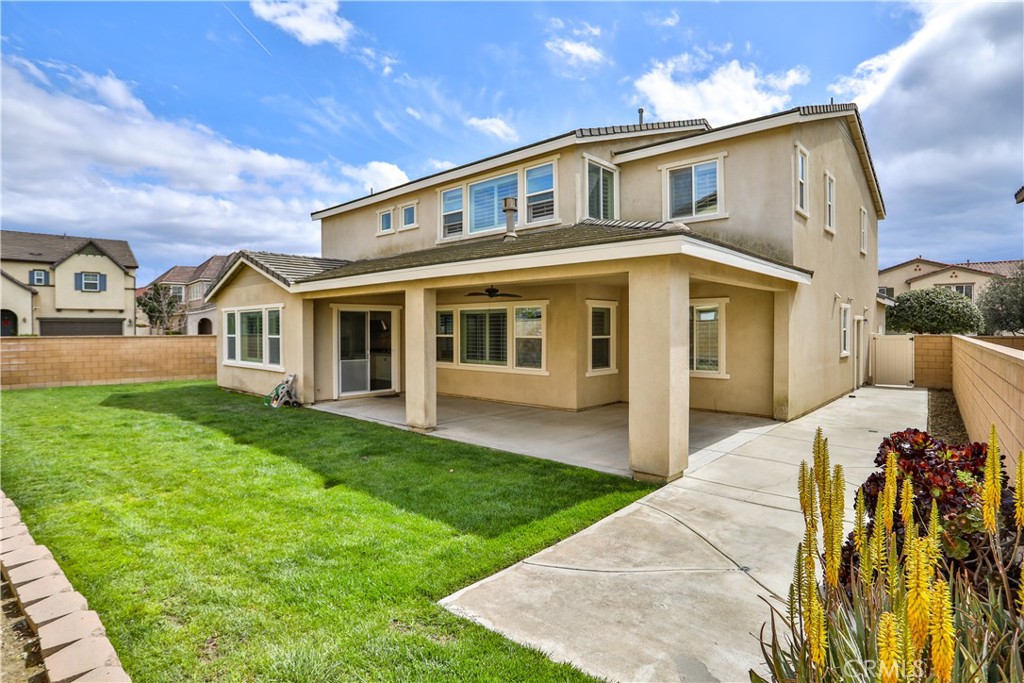 2795 Devonshire Lane Ontario, CA 91762 - Photo 4 of 50 a front view of a house with a yard