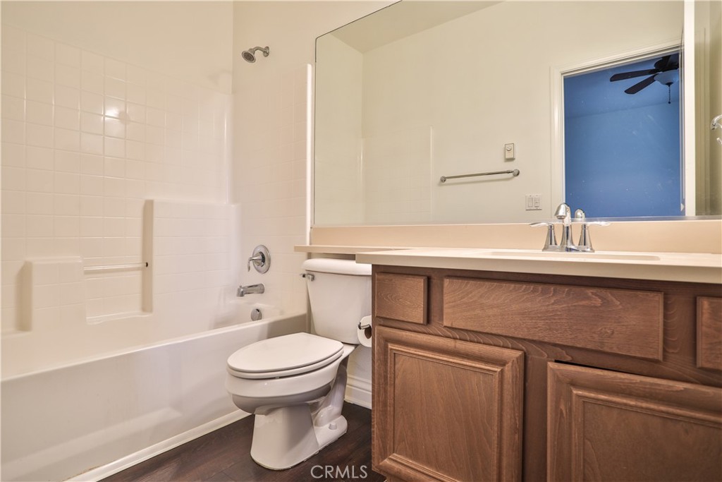 2795 Devonshire Lane Ontario, CA 91762 - Photo 44 of 50 a bathroom with a sink a toilet and shower