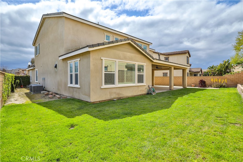 2795 Devonshire Lane Ontario, CA 91762 - Photo 5 of 50 a view of a house with a backyard