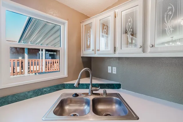 a kitchen with a stove and a microwave