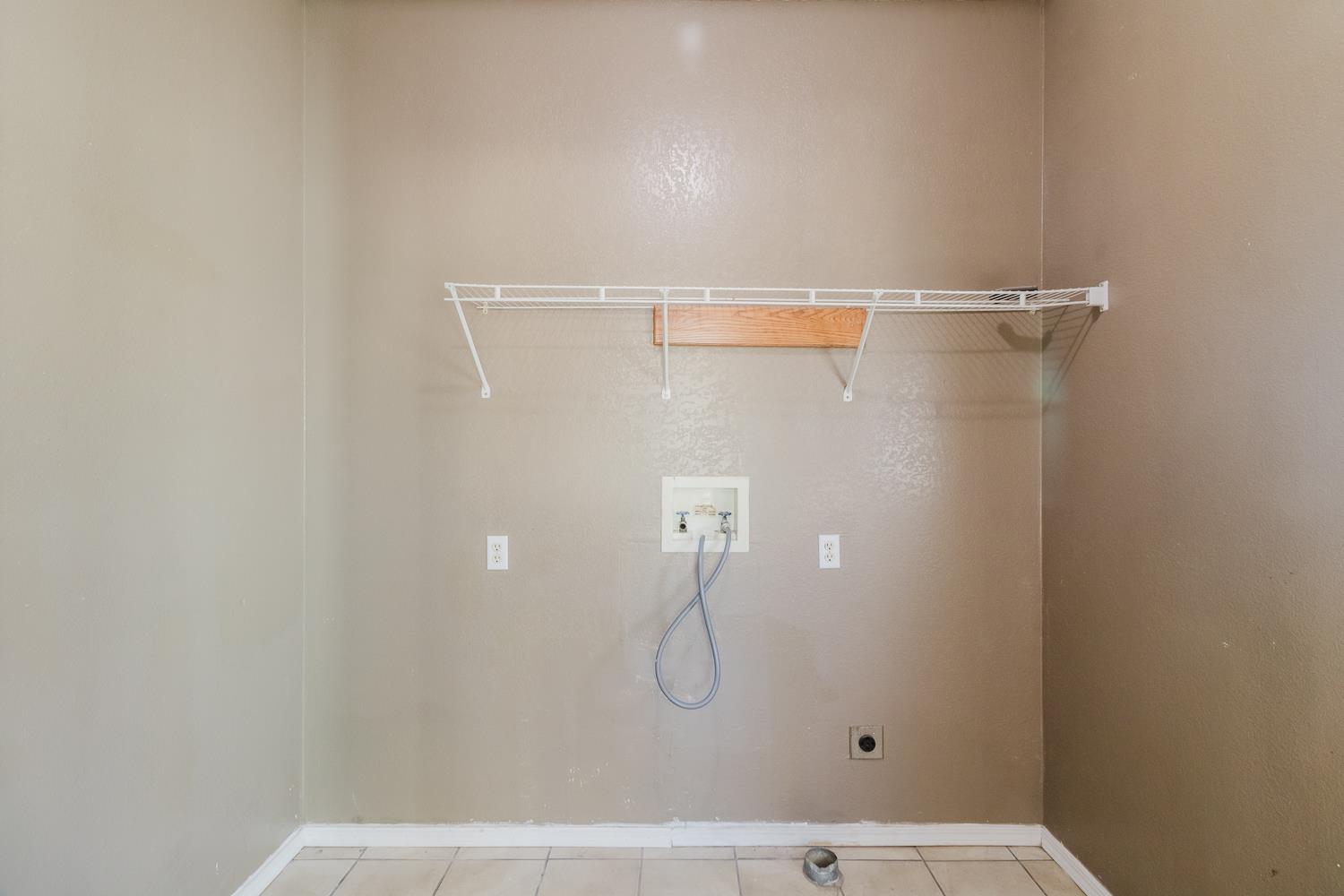 216 California Loop Sacramento, CA 95823 - Photo 28 of 42 a bathroom with a glass shower door