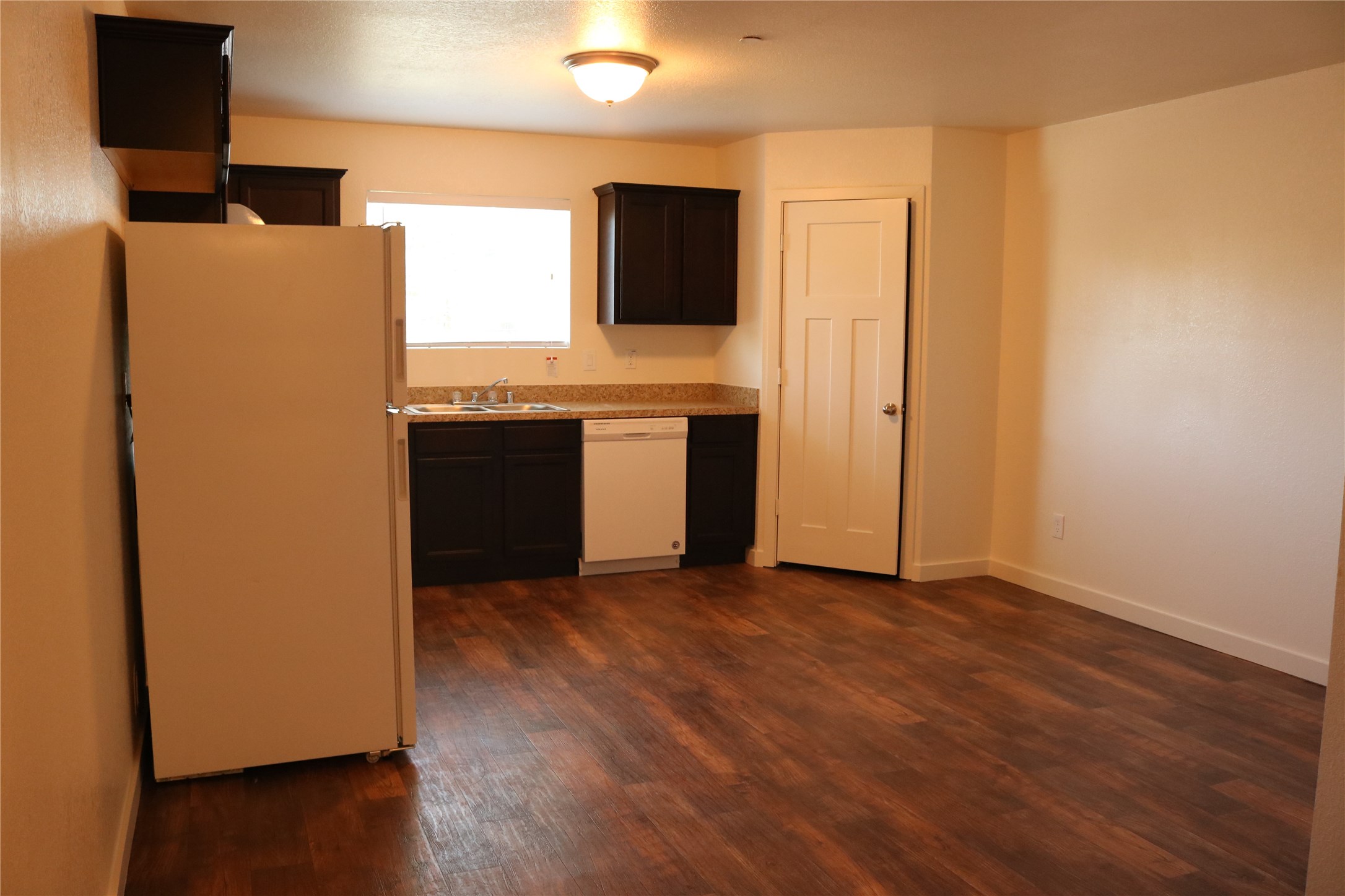 10535 Mills Road, Unit 9B Houston, TX 77070 - Photo 26 of 48 a view of kitchen with a refrigerator and a stove