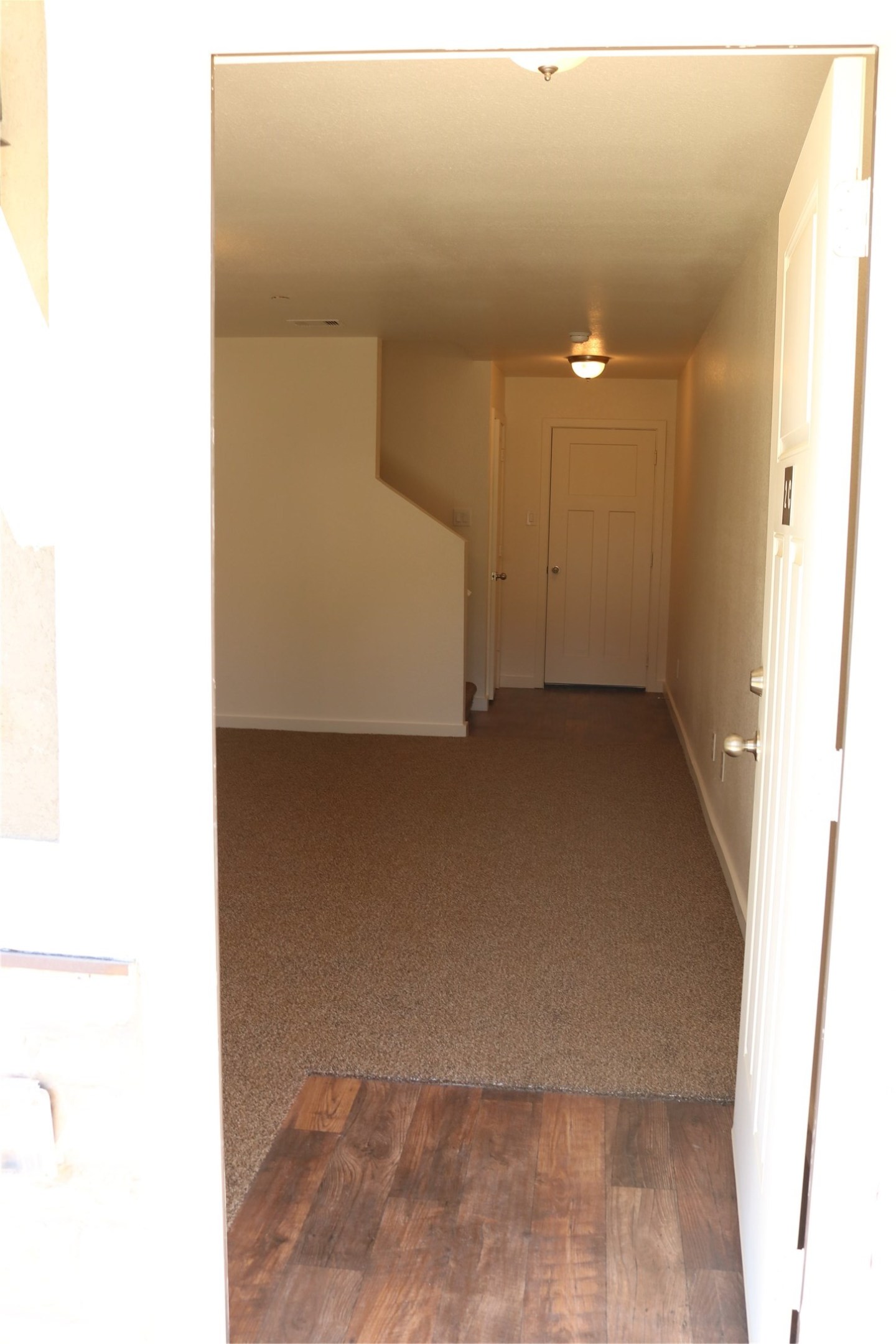 10535 Mills Road, Unit 9B Houston, TX 77070 - Photo 3 of 48 a view of a room with a hallway