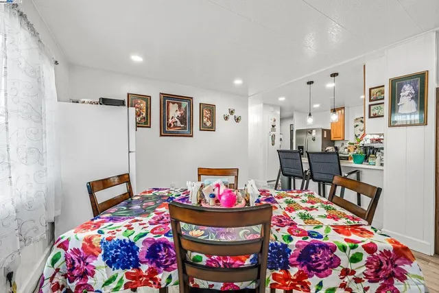 a bedroom with bed and furniture