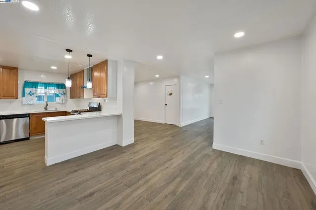 a bathroom with a sink a mirror and a shower
