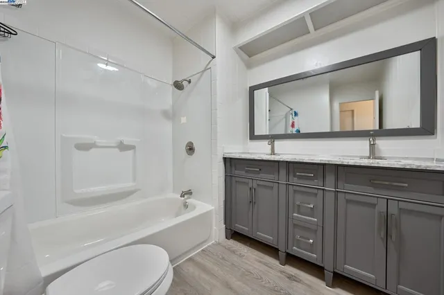 a bathroom with a bath tub and a shower