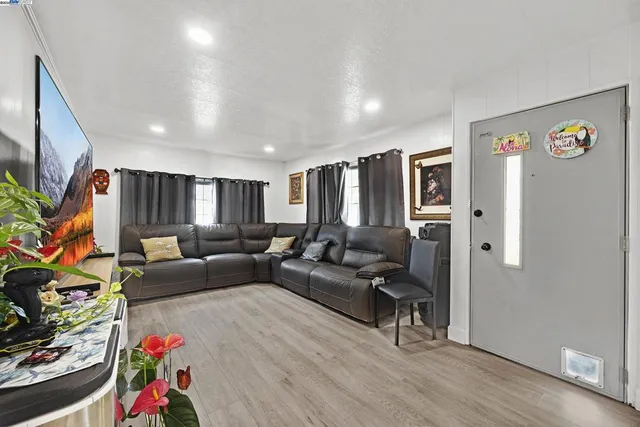 a living room with furniture and a couch