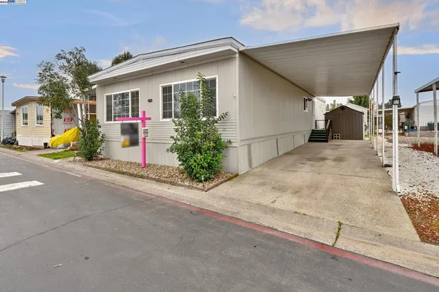 a view of a house with a patio