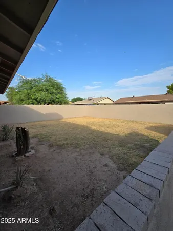 a view of a room with wooden walls
