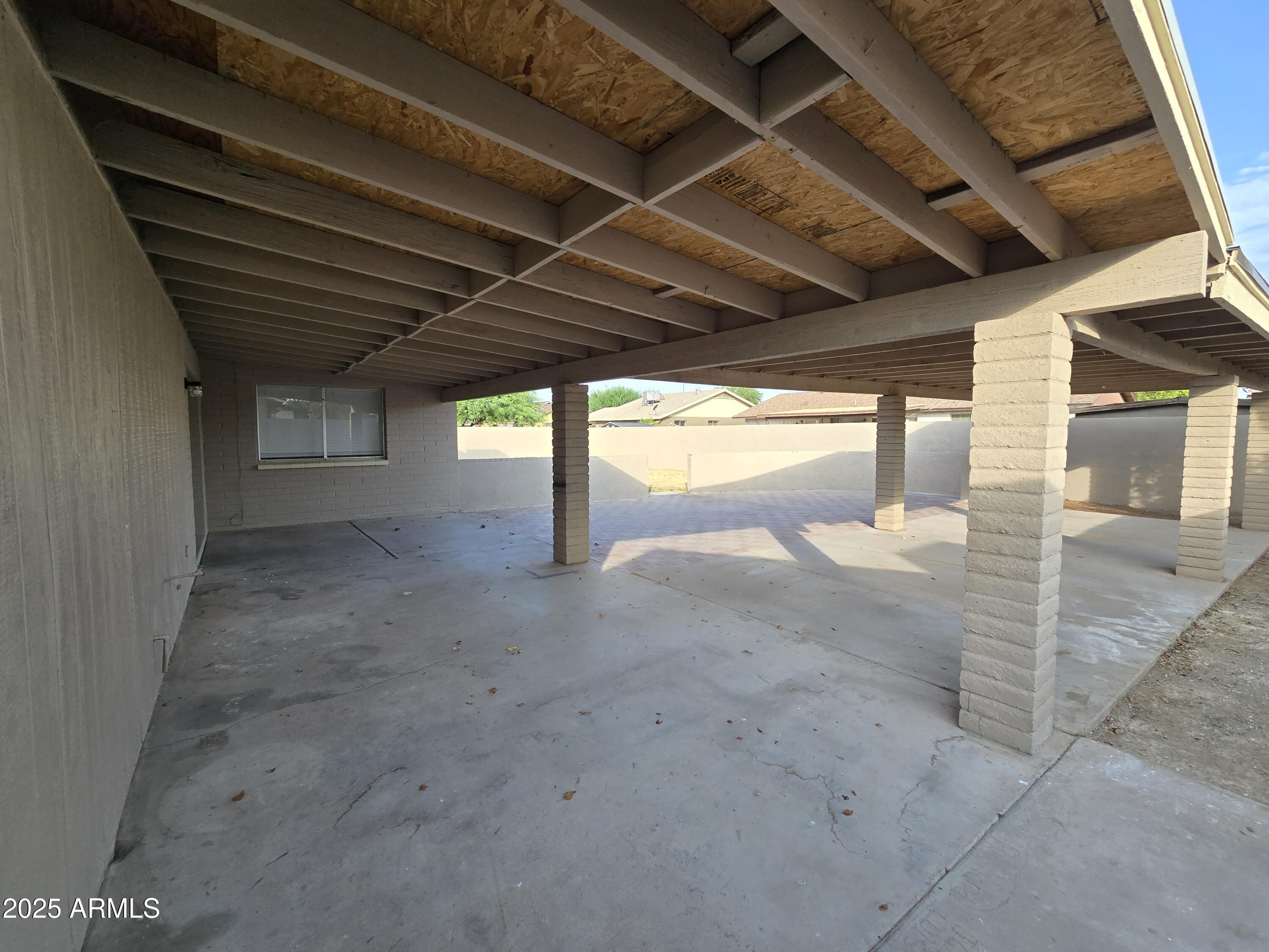 7752 West Flower Street Phoenix, AZ 85033 - Photo 26 of 30 a view of a room with wooden walls