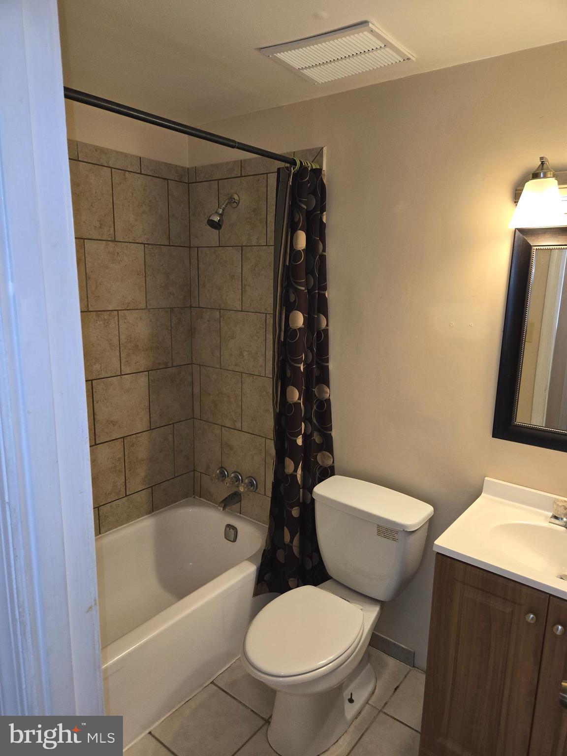 1850 Aberdeen Circle Crofton, MD 21114 - Photo 15 of 26 a white toilet sitting next to a bathtub