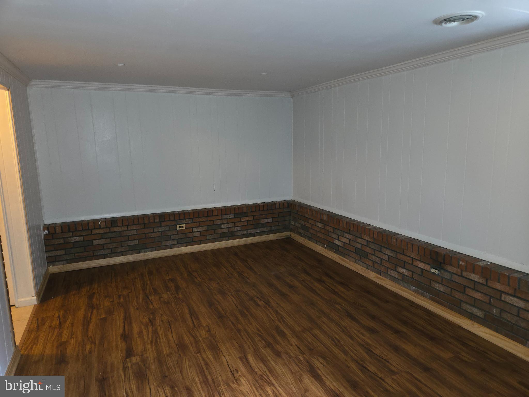 1850 Aberdeen Circle Crofton, MD 21114 - Photo 17 of 26 a empty room with wooden floor
