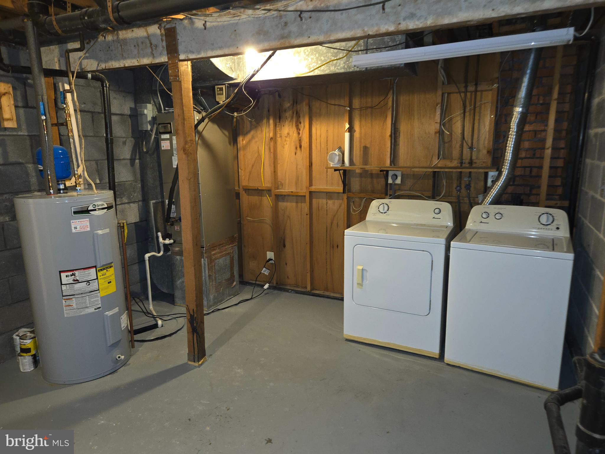 1850 Aberdeen Circle Crofton, MD 21114 - Photo 21 of 26 a view of storage and utility room with washer and dryer