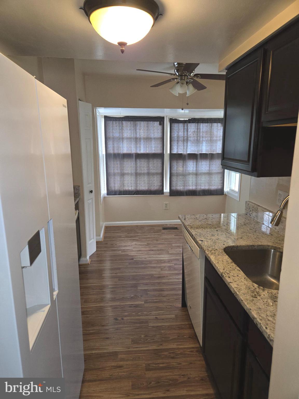 1850 Aberdeen Circle Crofton, MD 21114 - Photo 5 of 26 a view of a kitchen cabinets a sink and dishwasher