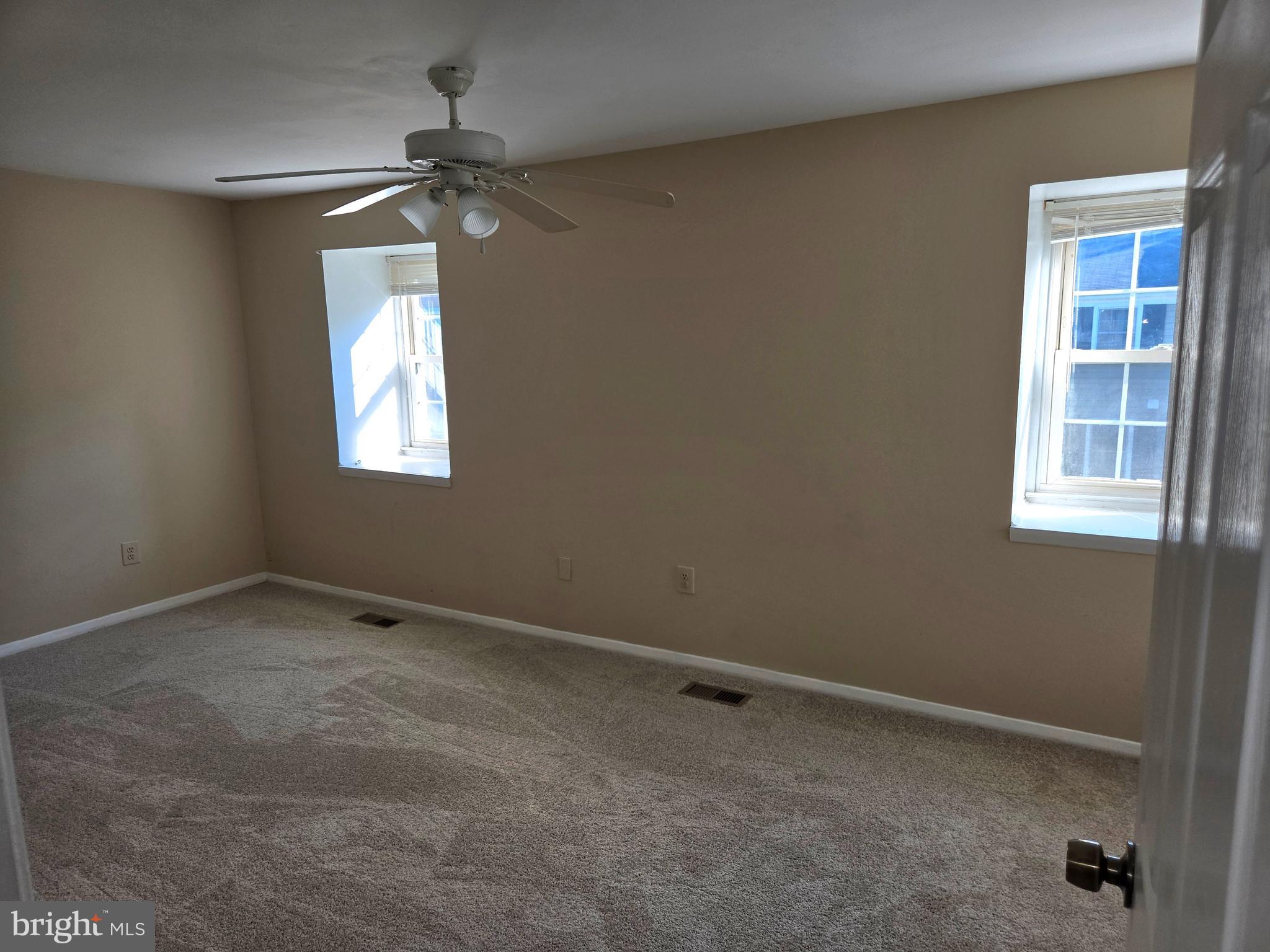 1850 Aberdeen Circle Crofton, MD 21114 - Photo 8 of 26 a view of an empty room with a window