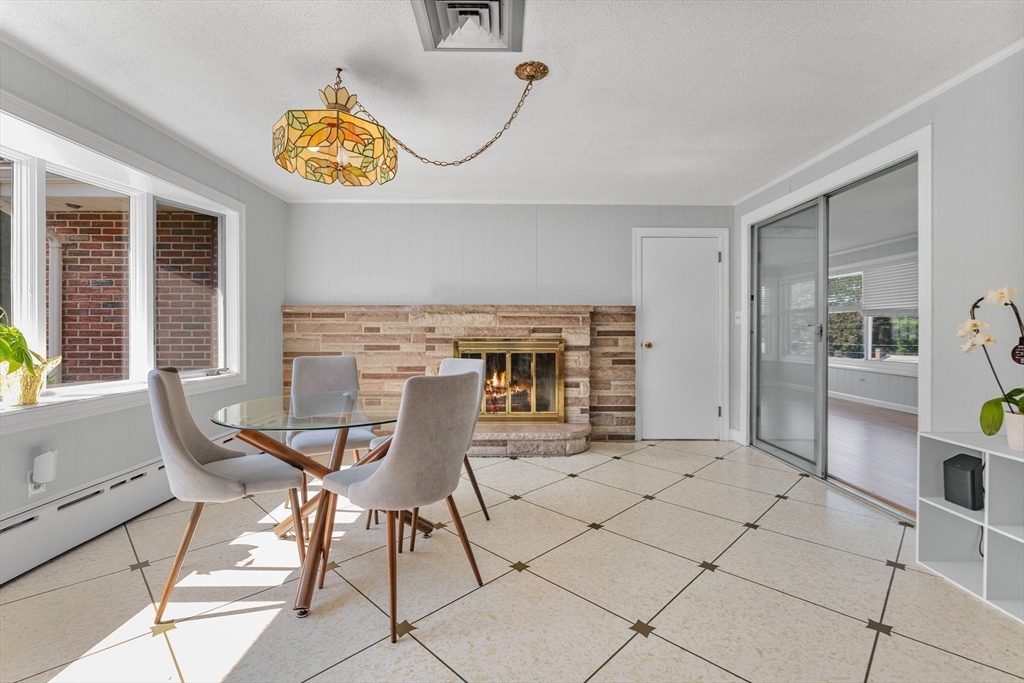 63 Sears Road Milton, MA 02186 - Photo 13 of 42 a view of a dining room and kitchen