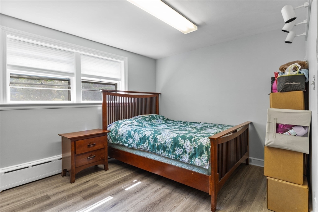 63 Sears Road Milton, MA 02186 - Photo 34 of 42 a bedroom with a bed and window