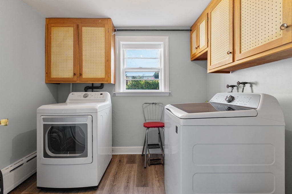 63 Sears Road Milton, MA 02186 - Photo 35 of 42 a utility room with sink dryer and washer