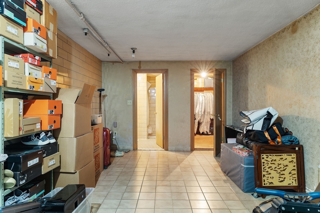 63 Sears Road Milton, MA 02186 - Photo 39 of 42 a view of an entryway with a workspace