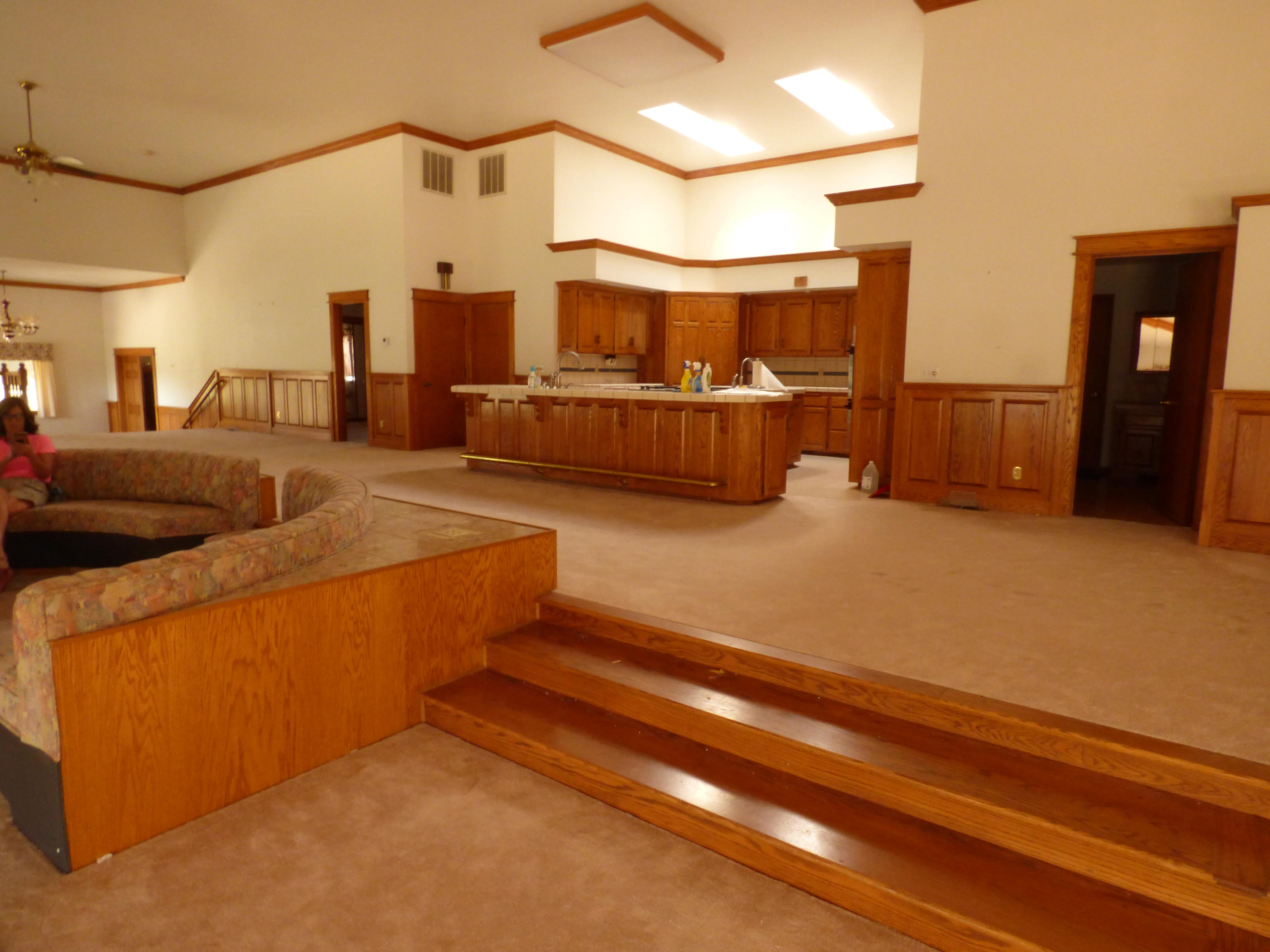 26602 Snider Ranch Road Oak Run, CA 96069 - Photo 14 of 18 a living room with couches and kitchen view