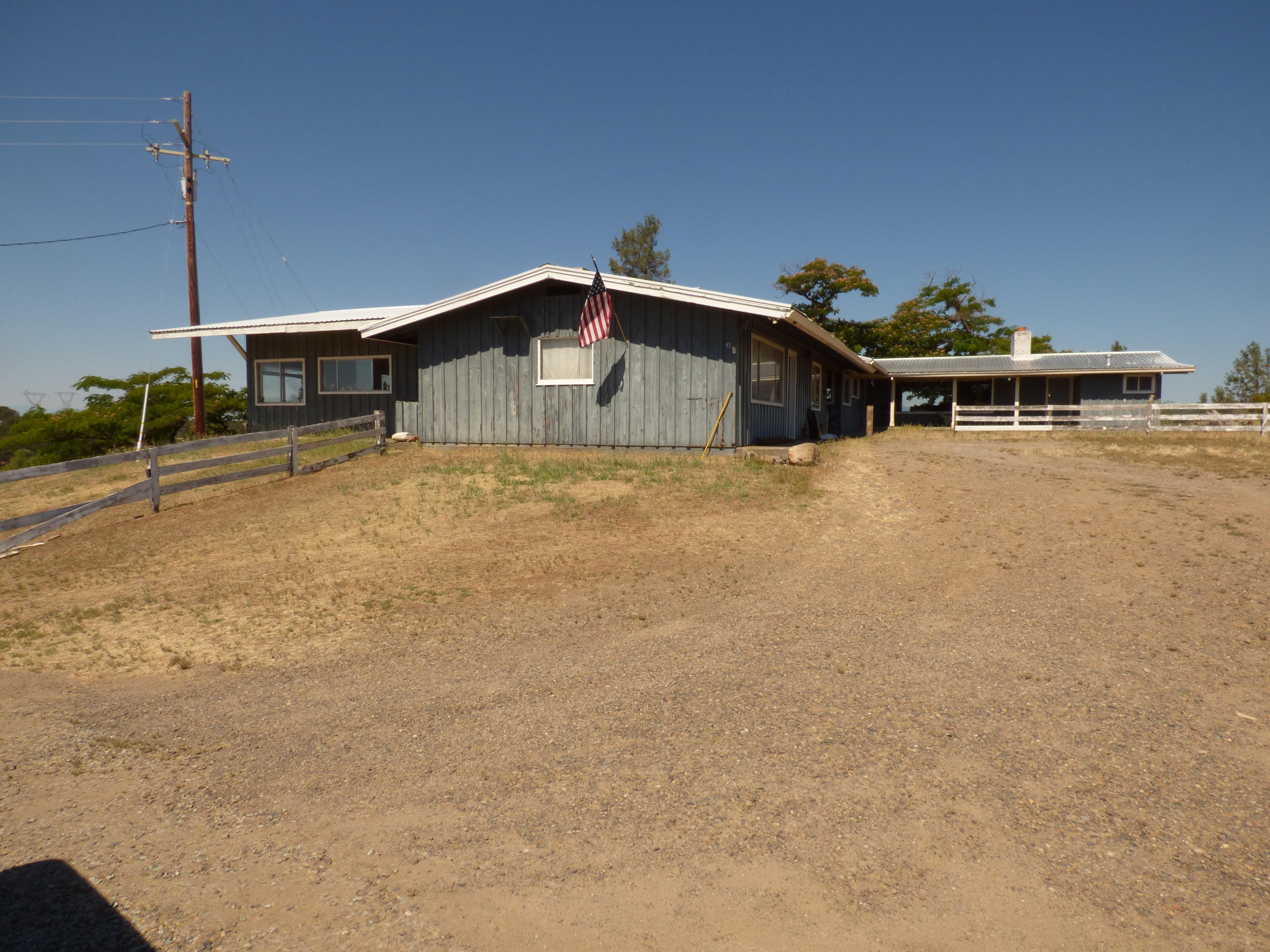 26602 Snider Ranch Road Oak Run, CA 96069 - Photo 2 of 18 a front view of a house with a yard