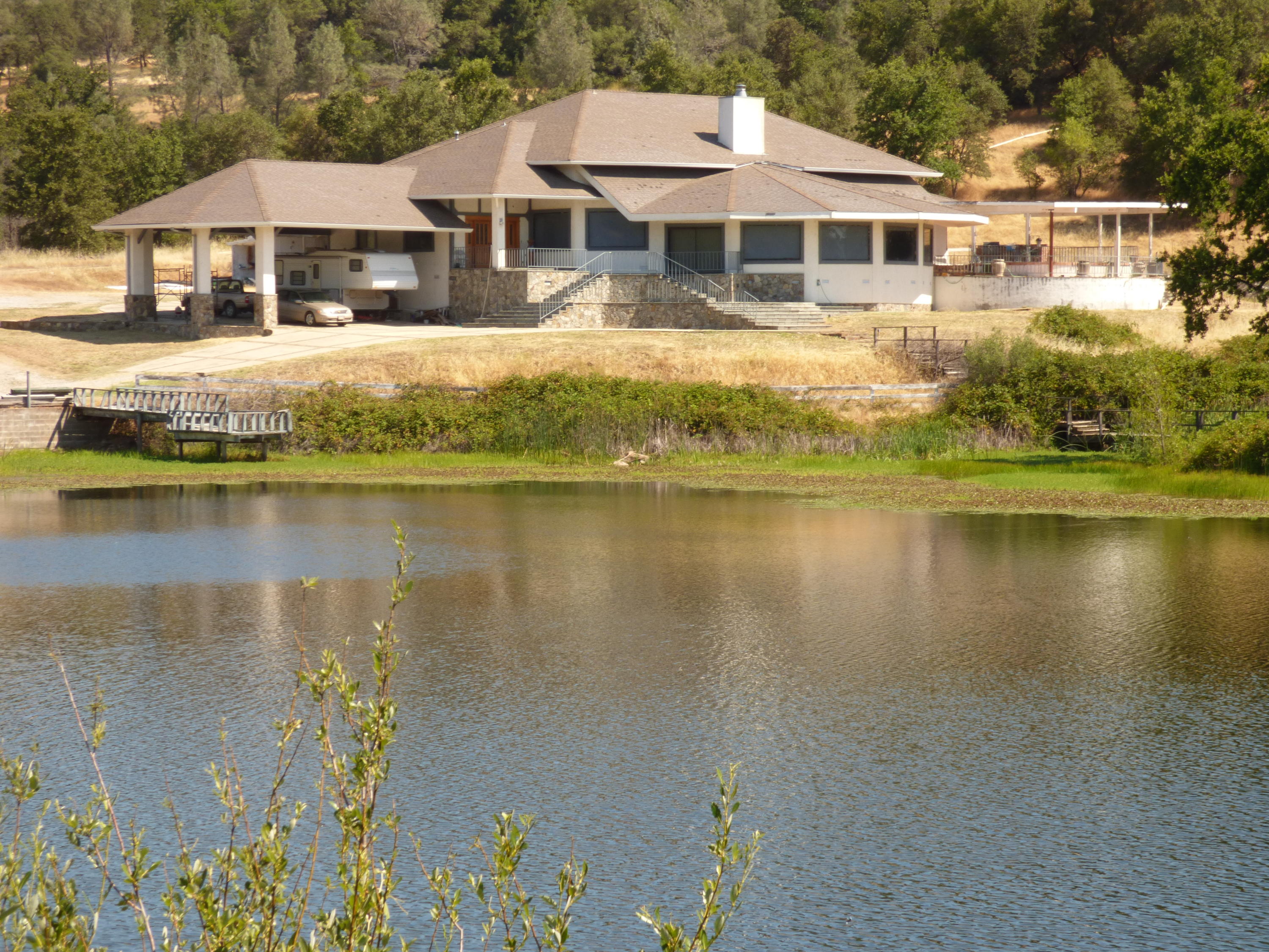 26602 Snider Ranch Road Oak Run, CA 96069 - Photo 8 of 18 a front view of a house with a ocean view