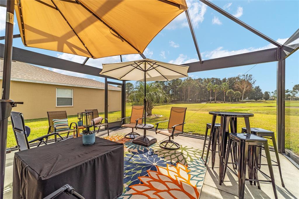 1056 Southwest 159th Street Ocala, FL 34473 - Photo 33 of 45 a view of an outdoor space with furniture and pool